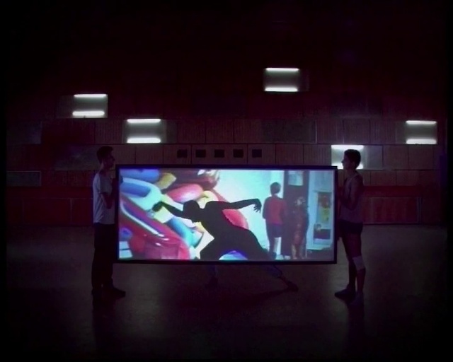 Video Reference N1: Entertainment, Display device, Projection screen, Magenta, Music venue, Performing arts, Flat panel display, Multimedia, Electronic device, Projector accessory