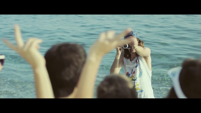 Video Reference N9: Water, Hand, Happy, Gesture, People on beach, Travel, Sunlight, Finger, Photographer, People in nature