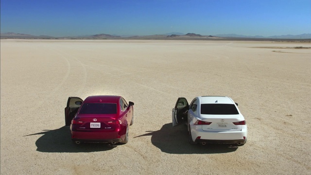 Video Reference N1: Vehicle, Car, Natural environment, Luxury vehicle, Sand, Landscape, Mode of transport, Desert, Mid-size car