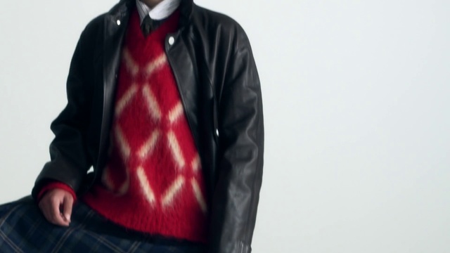 Video Reference N7: Clothing, Jacket, Leather, Outerwear, Red, Leather jacket, Scarf, Sleeve, Textile, Fashion