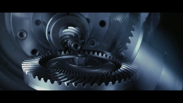 Video Reference N3: close up, hardware accessory, computer wallpaper, gear, wheel, macro photography, product, darkness, Person