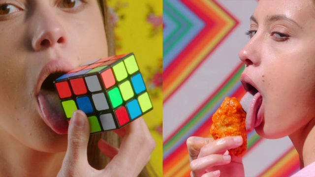 Video Reference N2: Rubiks cube, Toy, Sweetness, Puzzle, Eating, Mechanical puzzle, Junk food, Mouth, Finger, Confectionery
