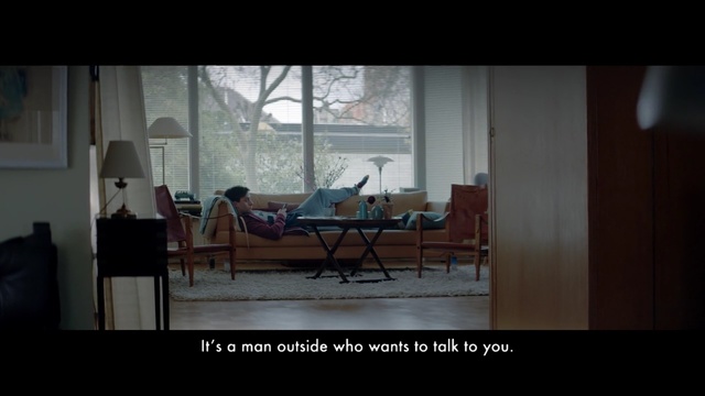 Video Reference N1: room, window, furniture, interior design, home, screenshot, table, darkness, chair, Person