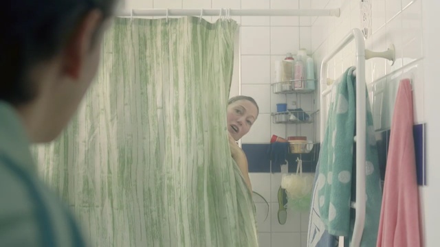 Video Reference N6: green, photograph, room, snapshot, textile, girl, interior design, design, product, curtain, Person