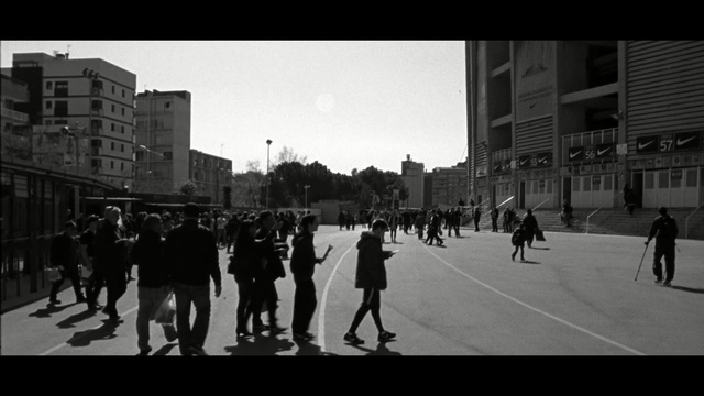 Video Reference N1: urban area, white, people, black, photograph, black and white, street, sky, city, infrastructure, Person