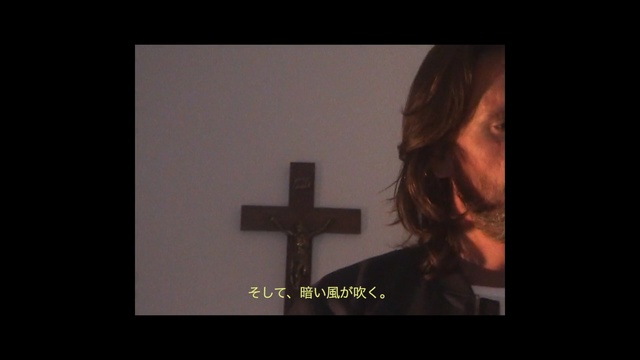 Video Reference N3: religious item, cross, mouth, darkness, neck, screenshot, symbol, facial hair, crucifix