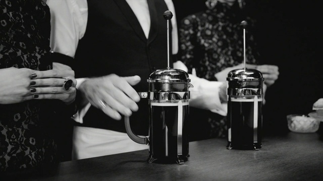 Video Reference N1: Black-and-white, Gentleman, Suit, Monochrome photography, Photography, Drum, Drink, Musical instrument, Style, Percussion