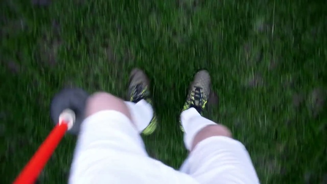 Video Reference N11: Grass, Green, Finger, Lawn, Hand, Leg, Grass, Footwear, Shoe, Foot
