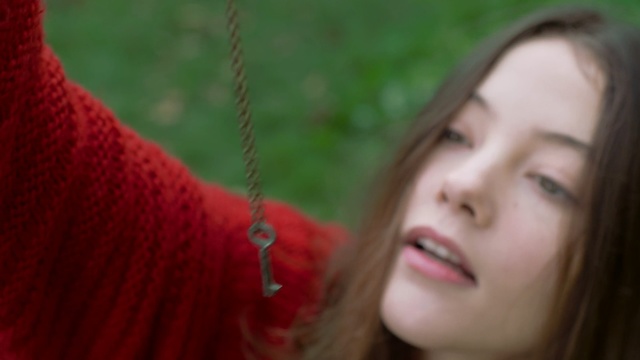 Video Reference N1: red, face, green, facial expression, nose, skin, beauty, human hair color, smile, lady