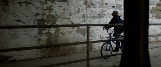 Video Reference N4: wall, bicycle, road bicycle, light, darkness, street, window, recreation, building, sky