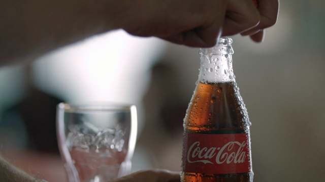Video Reference N1: drink, coca cola, cola, carbonated soft drinks, soft drink, bottle, beer, glass, glass bottle