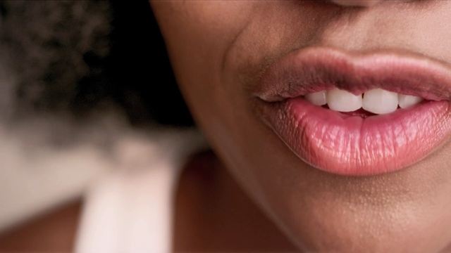 Video Reference N9: lip, chin, close up, cheek, mouth, smile, lipstick, jaw, eyelash, tongue
