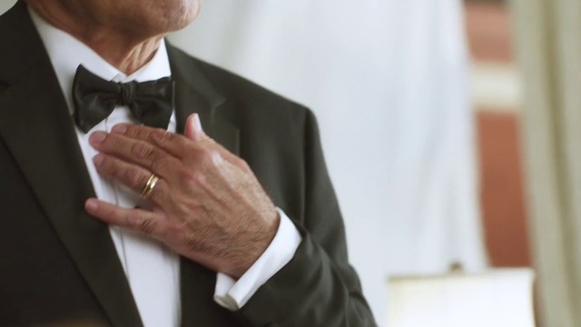 Video Reference N1: Suit, Formal wear, Tuxedo, White-collar worker, Gentleman, Businessperson, Groom, Fashion accessory, Tie