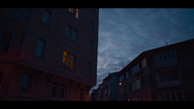 Video Reference N1: Cloud, Atmosphere, Window, Building, Sky, Dusk, Font, Tints and shades, Facade, Midnight