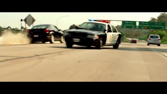 Video Reference N1: Land vehicle, Vehicle, Car, Police car, Mode of transport, Law enforcement, Ford crown victoria, Asphalt, Police, Sports sedan