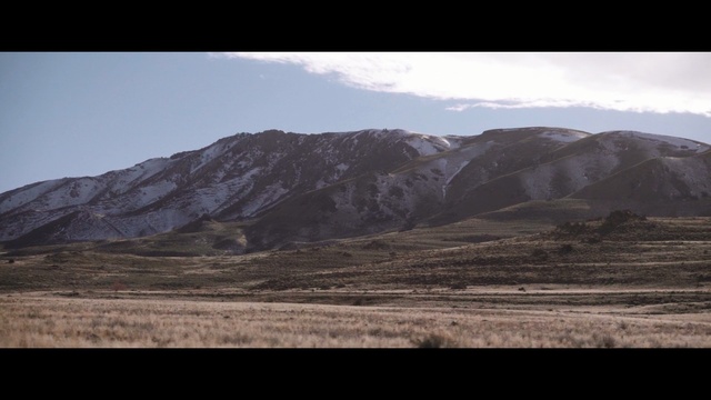 Video Reference N2: highland, sky, ecosystem, wilderness, mountainous landforms, mountain, badlands, hill, fell, tundra
