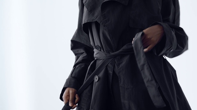 Video Reference N1: Black, Clothing, Outerwear, Coat, Trench coat, Robe, Sleeve, Overcoat, Jacket, Neck