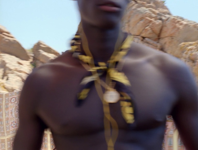 Video Reference N0: Yellow, Neck, Tribe, Human, Landscape, Scarf, Fashion accessory