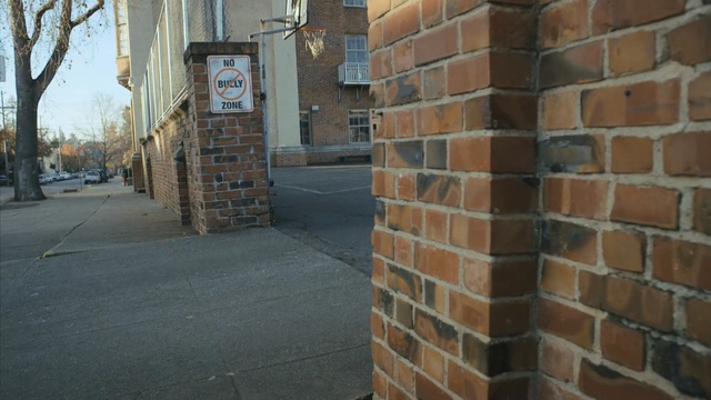 Video Reference N3: brickwork, wall, brick, alley, bricklayer, facade, sidewalk, road surface, window, street