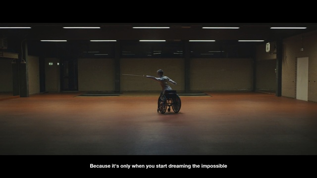 Video Reference N2: Light, Screenshot, Vehicle, Darkness, Motorcycle, Photography, Digital compositing, Indoor, Dark, Room, Game, Riding, Sitting, Man, Black, Board, Table, Computer, Clock, Standing, Night, Bicycle, Bike, Land vehicle, Wheel, Text, Sports equipment, Bicycle wheel