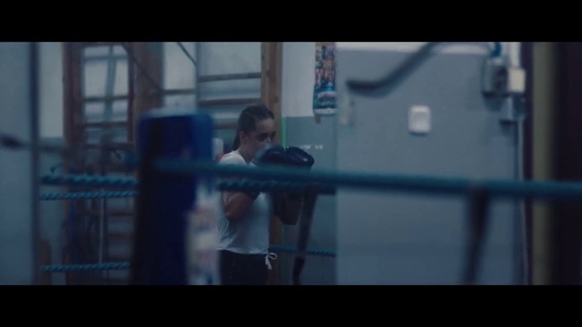 Video Reference N12: Shoulder, Mode of transport, Arm, Snapshot, Muscle, Joint, Iron, Window, Photography, Fun, Person, Indoor, Man, Front, Looking, Holding, Standing, Young, Room, Woman, Playing, Table, Food, Television, Ball, Kitchen, White, Video, Screenshot, Human face, Text, Clothing