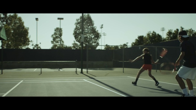 Video Reference N5: tennis, racquet sport, tennis court, sports, sport venue, net, ball game, player, soft tennis, real tennis