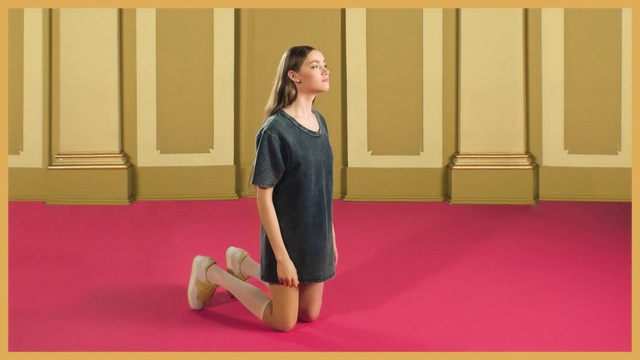 Video Reference N0: Shoulder, Leg, Joint, Arm, Sitting, Knee, Human leg, Thigh, Neck, Yellow, Person, Woman, Girl, Indoor, Standing, Red, Young, Front, Lady, Looking, Holding, Female, Rug, Waiting, Playing, Train, Room, Table, Bedroom, Bed, Pink, White, Suitcase, Wall, Clothing, Footwear, Furniture, Dress, High heels, Human face, Skirt