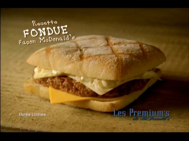 Video Reference N2: hamburger, fast food, breakfast sandwich, sandwich, junk food, cheeseburger, food, finger food, ham and cheese sandwich, american food
