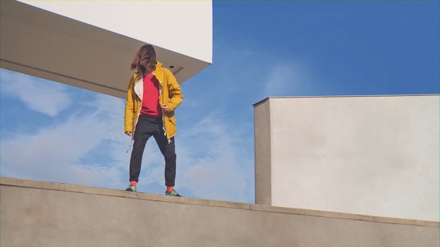 Video Reference N3: Blue, Yellow, Standing, Fashion, Wall, World, Trousers, Art, Person, Woman, Man, Young, Board, Holding, Girl, Riding, Boy, Sign, Ramp, Jumping, Large, Air, Table, Flying, White, Snow, Slope, Doing, Clothing, Sky, Footwear, Text, Jeans