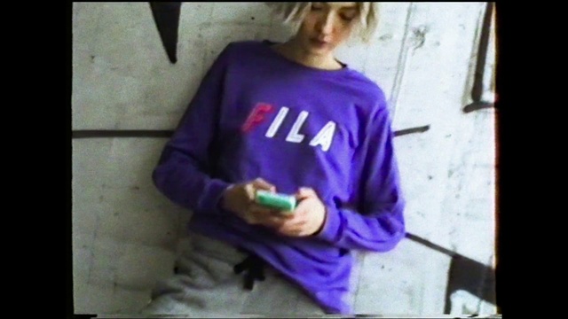Video Reference N1: T-shirt, Purple, Violet, Clothing, Sleeve, Cool, Snapshot, Arm, Sweater, Human