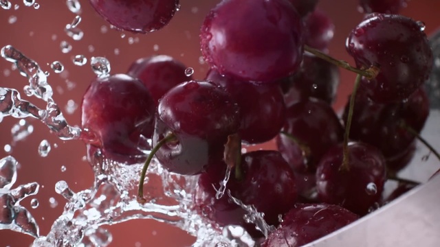Video Reference N1: Grape, Fruit, Food, Cherry, Grapevine family, Plant, Natural foods, Superfood, Seedless fruit, Vitis, Table, Indoor, Plate, Cup, Sitting, Filled, Chocolate, White, Holding, Topped, Cake, Red, Covered, Close, Glass, Bowl, Cheese, Berry, Frutti di bosco, Dessert