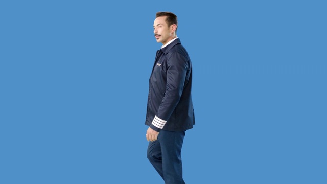 Video Reference N7: Blue, Clothing, Suit, Standing, Outerwear, Blazer, Collar, Formal wear, Jacket, Sleeve