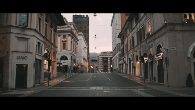 Video Reference N2: town, street, road, urban area, infrastructure, city, alley, downtown, lane, metropolis, Person