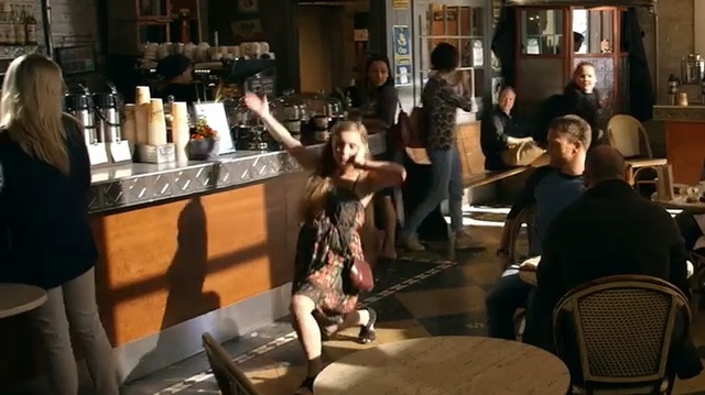 Video Reference N0: woman, man, people, coffee, coffeeshop, dance  