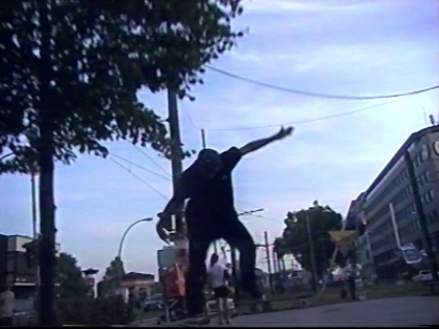Video Reference N2: Freestyle bmx, Street light, Tree, Street stunts, Flatland bmx, Light fixture, Bicycle motocross, Pedestrian, Extreme sport, Traffic light