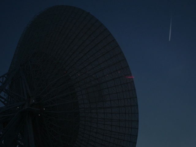 Video Reference N1: sky, tourist attraction, architecture, daytime, atmosphere, night, ferris wheel, building, darkness, metropolis