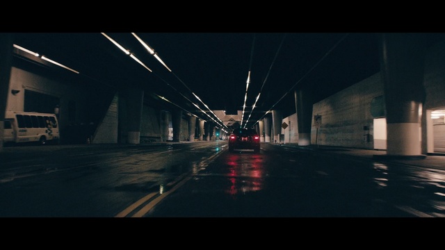 Video Reference N1: Red, Light, Sky, Darkness, Mode of transport, Night, Urban area, Line, Infrastructure, Atmosphere