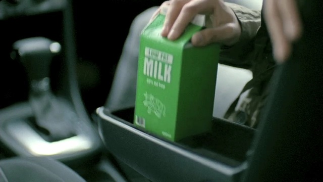 Video Reference N0: green, product, bottle, vehicle, product, car, drink, Person