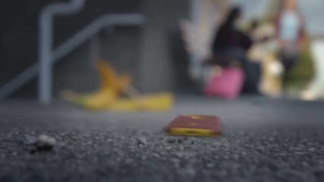 Video Reference N5: Asphalt, Yellow, Road surface, Snapshot, Public space, Footwear, Shoe, Floor, Road, Photography