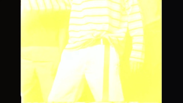 Video Reference N4: clothing, yellow, white, text, joint, shoulder, sleeve, font, line, outerwear
