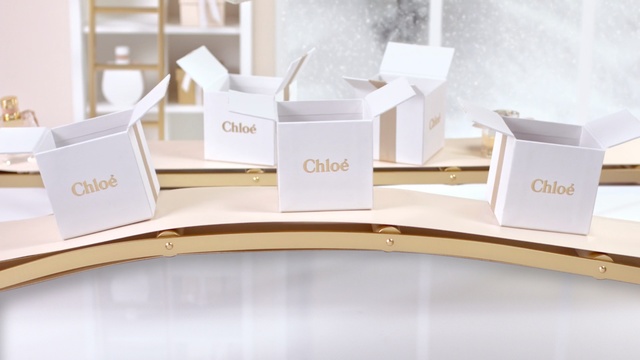 Video Reference N1: Product, Text, Furniture, Place card, Office, Shelf, Desk, Brand, Table, Interior design, Person