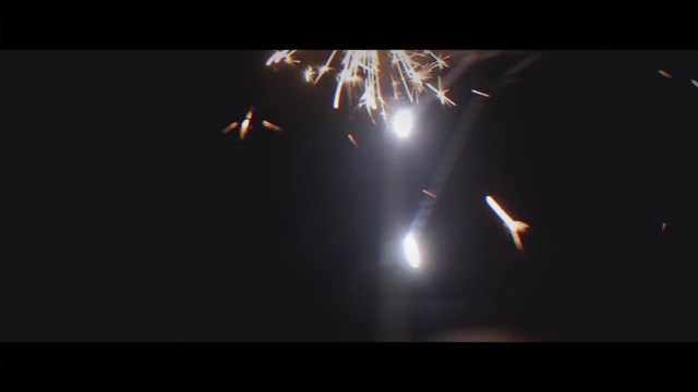Video Reference N2: fireworks, darkness, event, light, night, sky, public event, sparkler, recreation, midnight