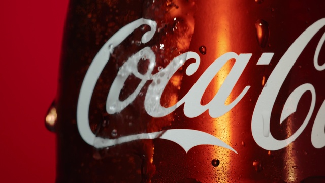 Video Reference N4: Coca-cola, Cola, Drink, Carbonated soft drinks, Soft drink, Coca, Font, Non-alcoholic beverage, Beverage can, Plant