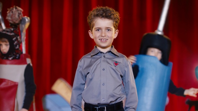Video Reference N3: Child, Talent show, Fun, Event, Performance, Uniform, Gesture, Smile, Ceremony, Person