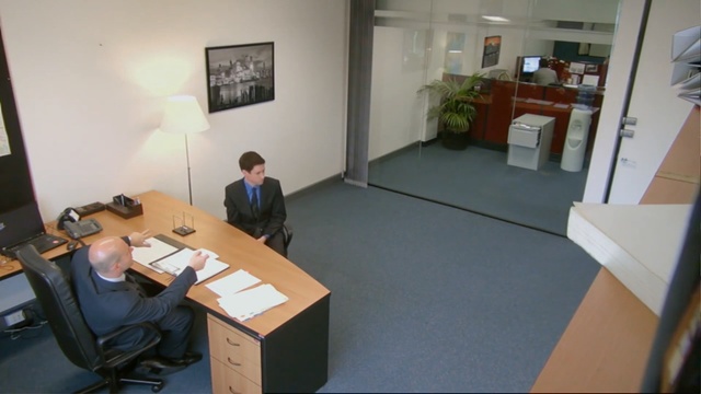 Video Reference N1: Office, Room, Floor, Furniture, Architecture, Flooring, Building, Interior design, Desk, Person