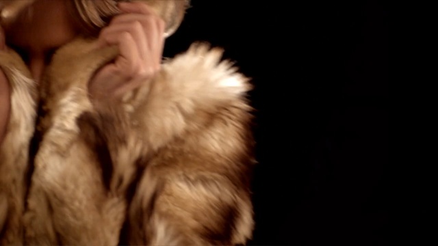 Video Reference N4: fur clothing, fur, textile, long hair, material, snout, girl, brown hair
