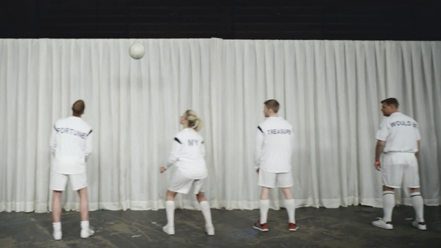 Video Reference N3: white, clothing, team, shoulder, male, standing, uniform, product, t shirt, competition, Person