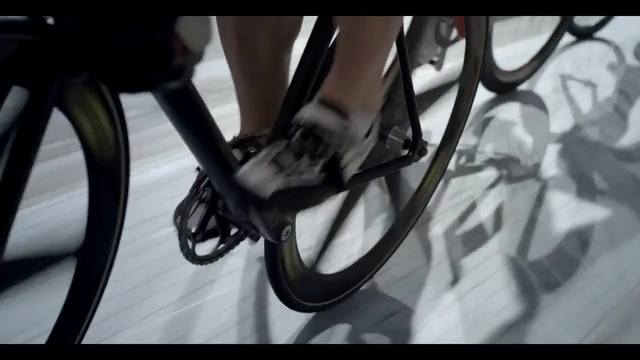 Video Reference N4: Bicycle part, Bicycle wheel, Bicycle drivetrain part, Bicycle, Bicycle tire, High heels, Spoke, Bicycle frame, Footwear, Vehicle, Person