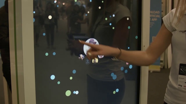 Video Reference N1: Hand, Technology, Electronic device, Display case, Space, Glass, Liquid bubble, Person