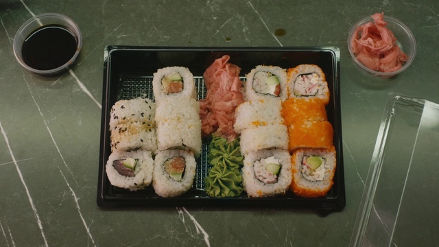 Video Reference N1: Dish, Food, Cuisine, Sushi, Gimbap, California roll, Steamed rice, Ingredient, Rice ball, Meal